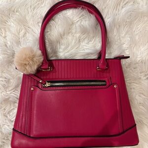 Elegant Pink Handbag with Pom Pom